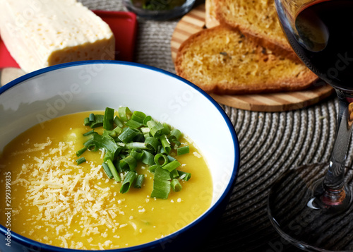 soup with bread, wine and cheese