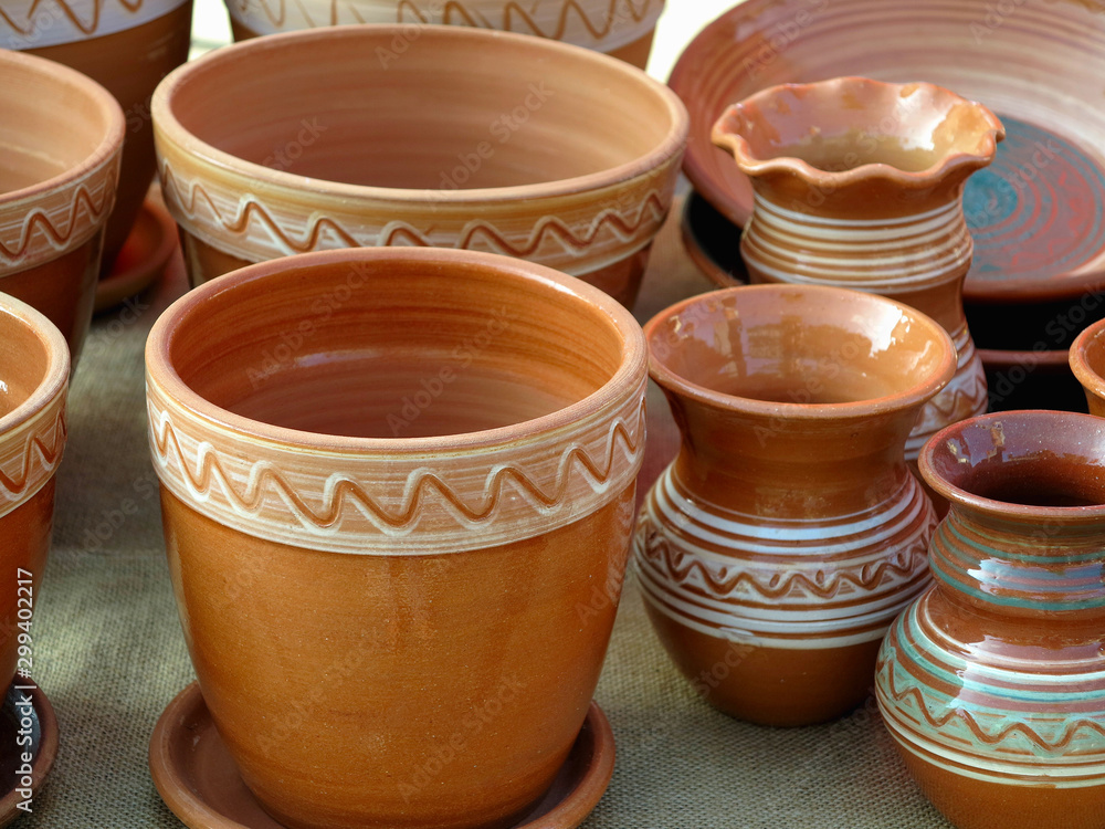 Beautiful handmade clay pots and other dishes sold at the fair Beautiful handmade clay pots and other dishes sold at the fair