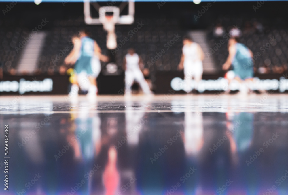 blurred background of basketball players on court during game - very shallow depht of field blurred background of basketball players on court during game - very shallow depht of field