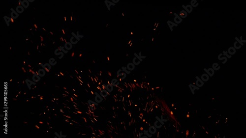 Real flame with sparks background clip in amazing detail. To be used as a track matte to add explosive particles to your project photo