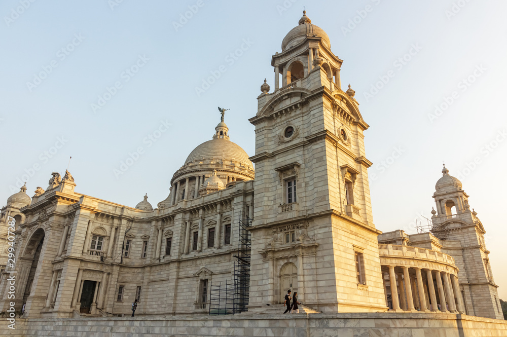 Kolkata, West Bengal/India - January 23 2018: Evening light hits the Victoria Memorial, the large elegant colonial monument built of white marble, dedicated to Queen Victoria.