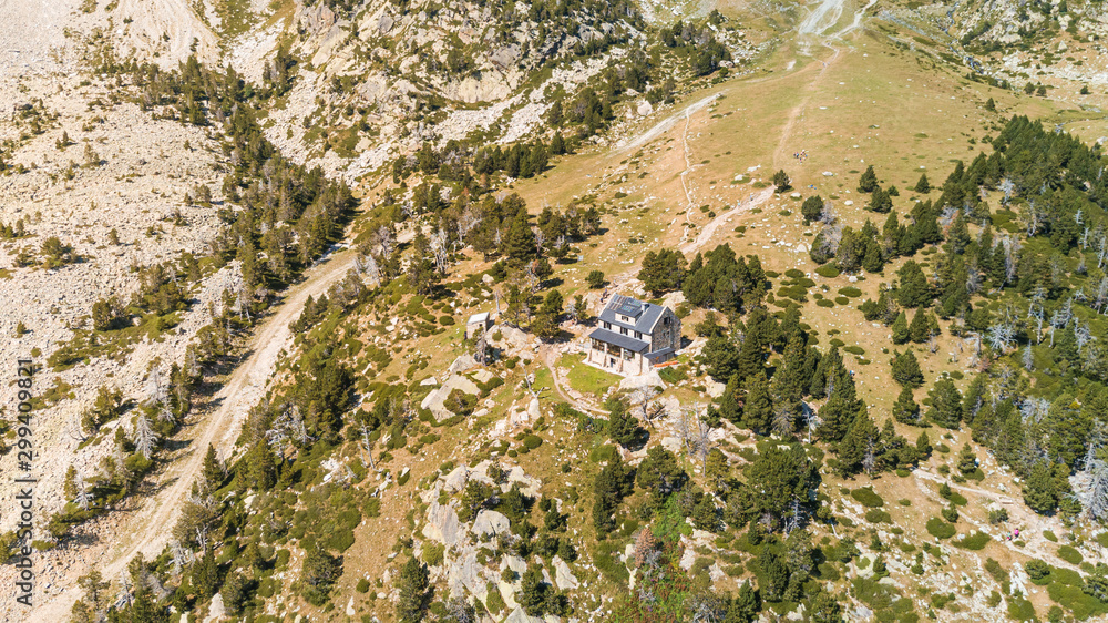 Aerial view of isolated house at rock landscape, Girona, Spain. Aerial view of isolated house at rock landscape, Girona, Spain.