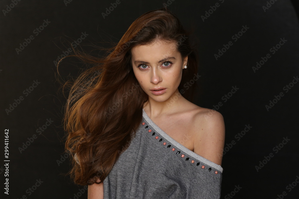 Naklejka premium Beautiful young female brunette model