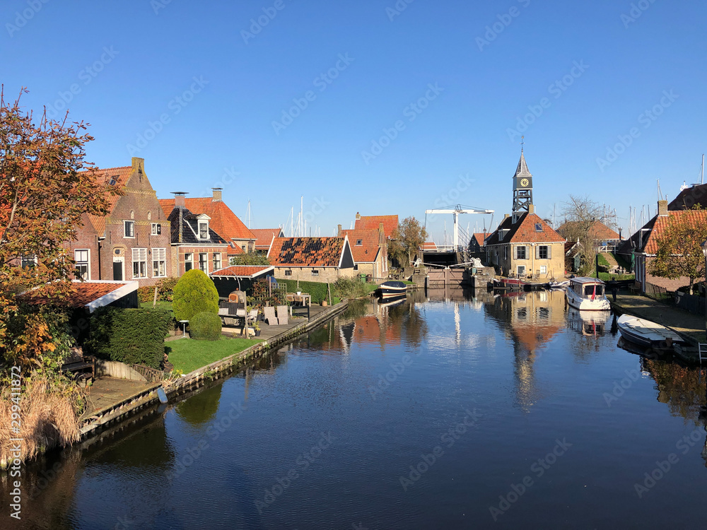 Canal in Hindeloopen during autumn Canal in Hindeloopen during autumn