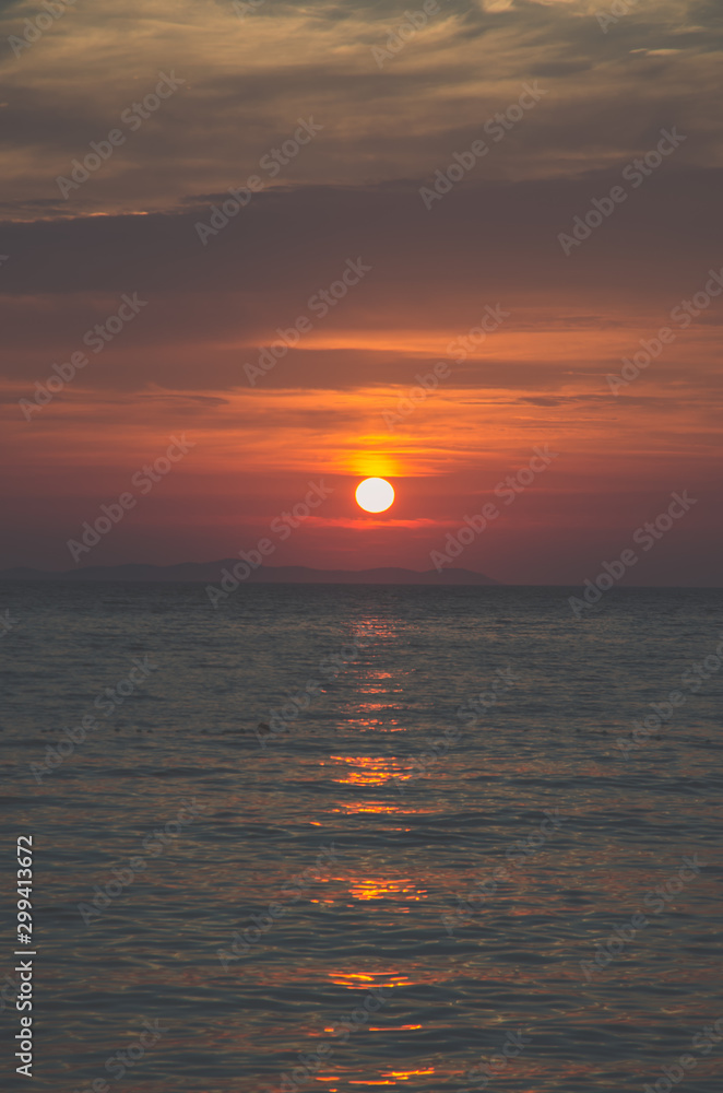 matte blue orange sunset by the sea