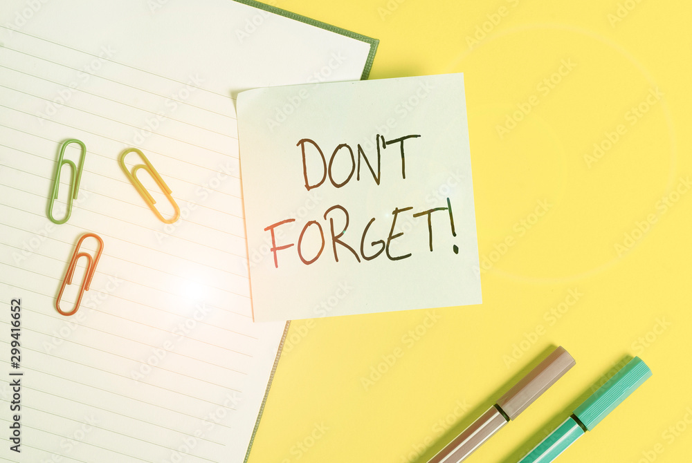 Word writing text Don T Forget. Business photo showcasing used to remind someone about important fact or detail Empty blue paper with copy space paper clips and pencils on the yellow table Word writing text Don T Forget. Business photo showcasing used to remind someone about important fact or detail Empty blue paper with copy space paper clips and pencils on the yellow table