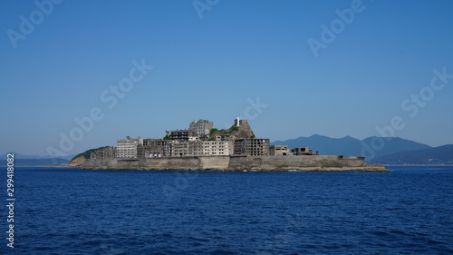 Gunkanjima is an abandoned city of a coal miners on the Hashima island in Japan. Panoramic view.