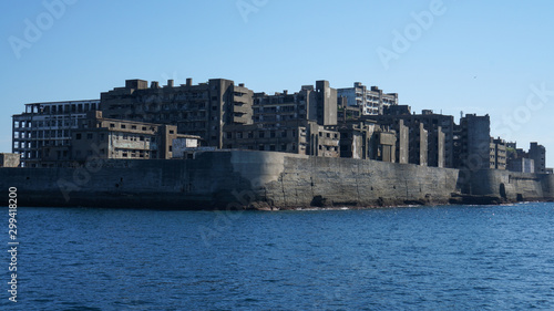 Gunkanjima is an abandoned city of a coal miners on the Hashima island in Japan. Panoramic view.