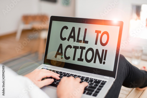 Text sign showing Call To Action. Business photo text exhortation do something in order achieve aim with problem woman laptop computer office supplies technological devices inside home