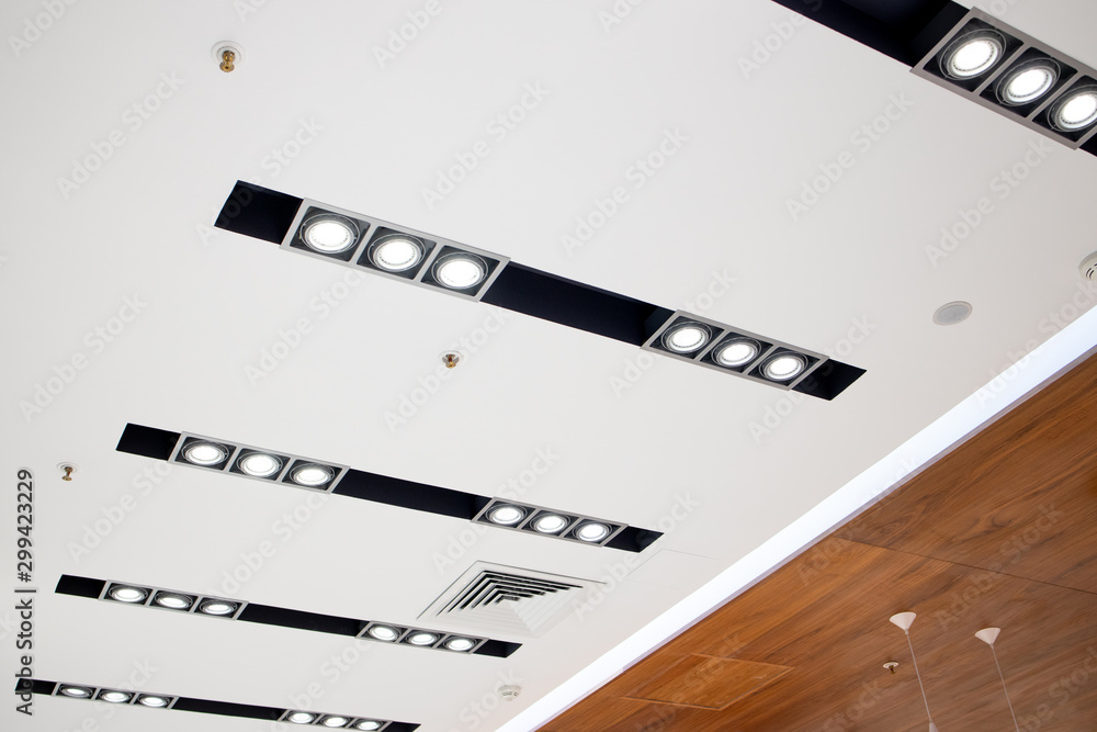Shopping center led lighting. Ceiling lights in the mall. Ventilation and  fire alarm system... Photos | Adobe Stock