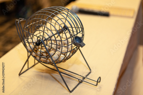 Bingo cage on a light colored table
