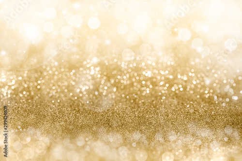 Golden Christmas background with sparkling and twinkling bokeh