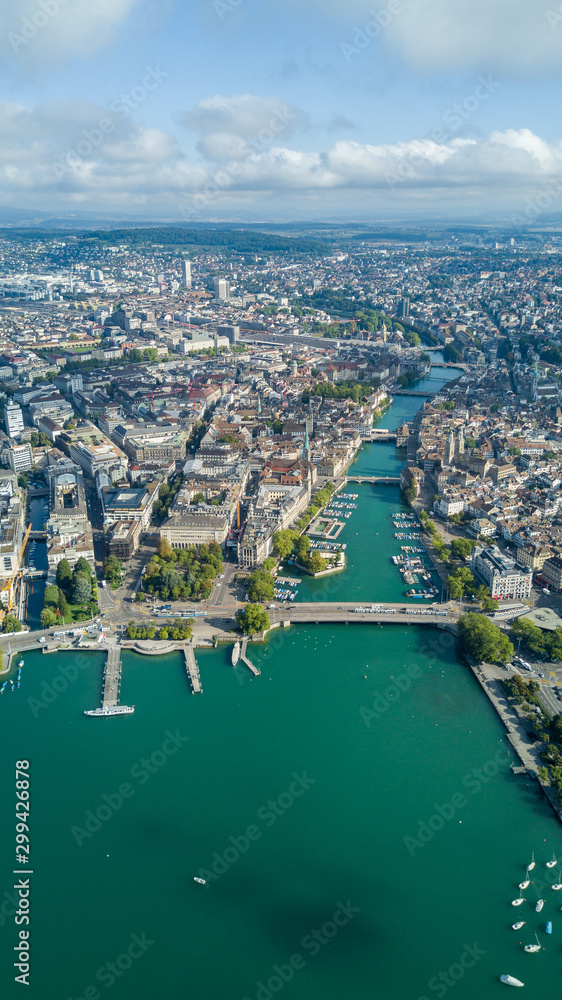 Beautiful aerial drone view of Zurich city and lake, during summer time, in Switzerland