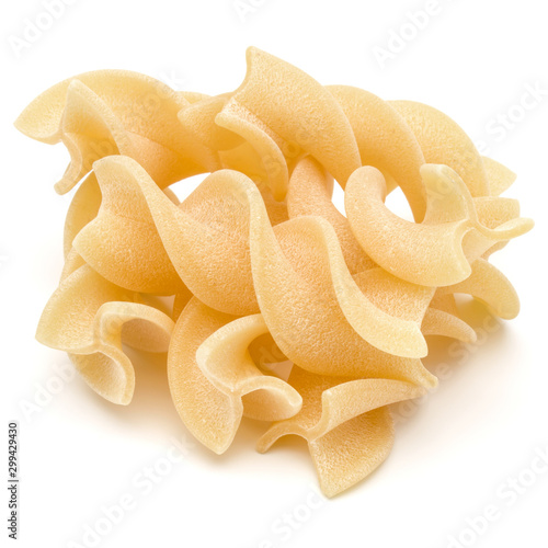 Italian  twisted pasta fusilli isolated on white background. Fusilloni, rotini. photo