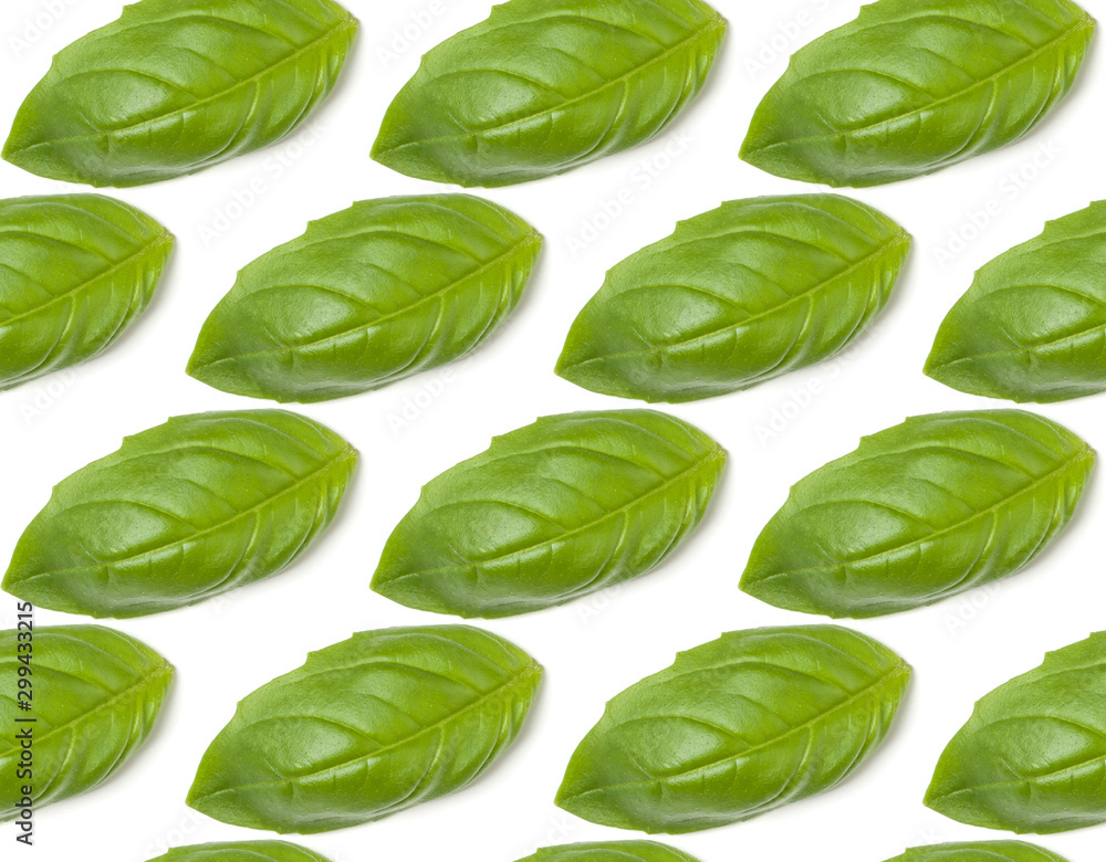 Obraz premium Sweet Basil herb leaves isolated on white background closeup. Flat lay, top view. Seamless pattern.