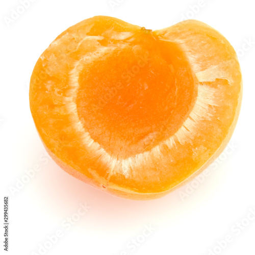One apricot half isolated on white background cutout