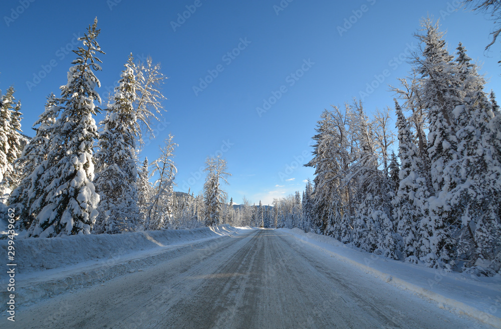 Snowed road through the winter forest in Manning Park, BC. Snowed road through the winter forest in Manning Park, BC.