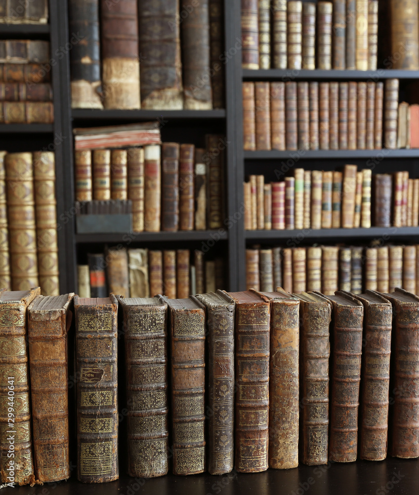 old books on wooden shelf. old books on wooden shelf.