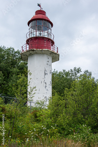 old lighthouse on background of stormy sky