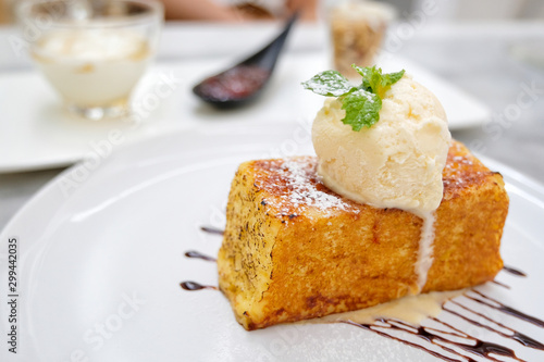 Close up Dessert of honey toast with ice cream and whip cream.