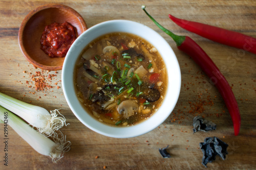 Food photography of the Chinese soup suan la tang or Peking soup photo