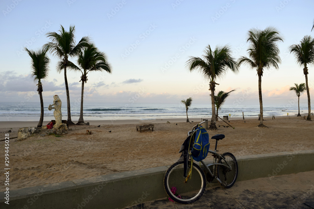Fototapeta premium Deserted beach with parked bike