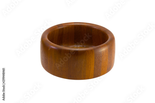 Salad bowl empty of solid white rubber oak teak wood laminated round with spoon ladle tong stirrer fork isolated on white background.