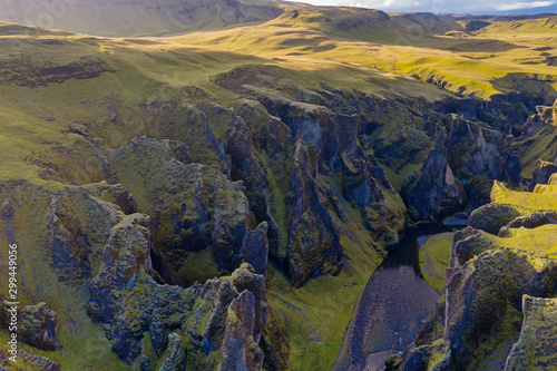 The most picturesque canyon Fjadrargljufur and the shallow creek, which flows along the bottom of the canyon. Fantastic country Iceland. September 2019. aerial drone shot © Сергій Вовк