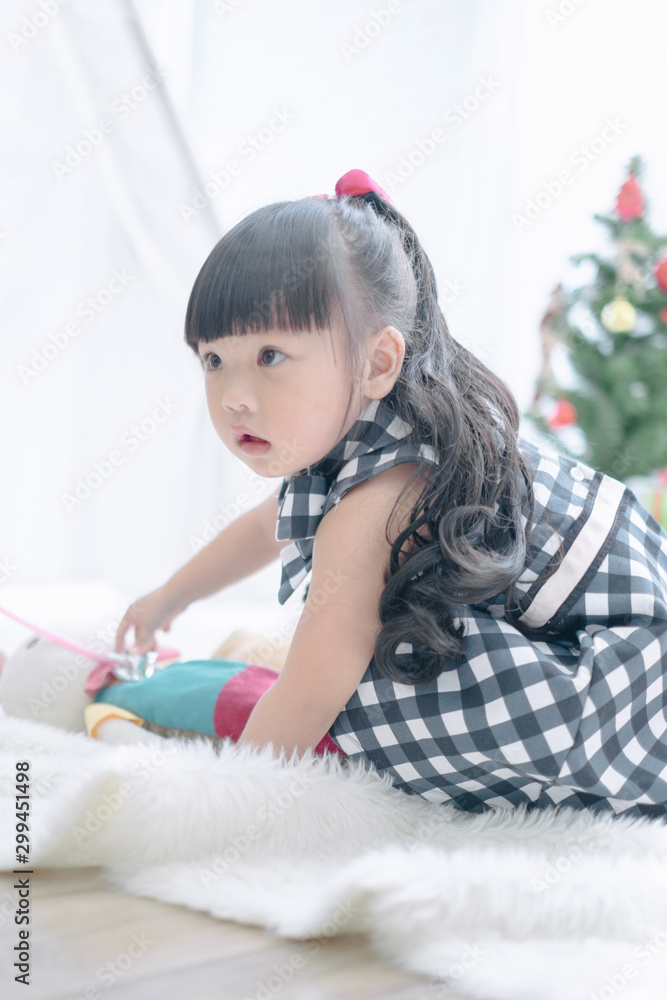 Merry christmas happy little child with beautifully decorated christmas tree holidays in home, christmas concept Merry christmas happy little child with beautifully decorated christmas tree holidays in home, christmas concept