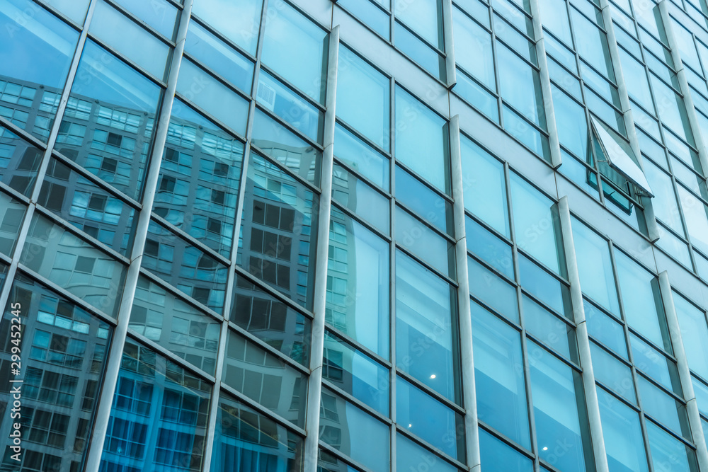 Urban abstract - windowed corner of office building.