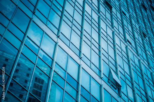Urban abstract - windowed corner of office building.