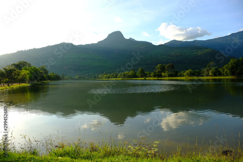 Pond mountain and sky very beautiful view and feeling relax.