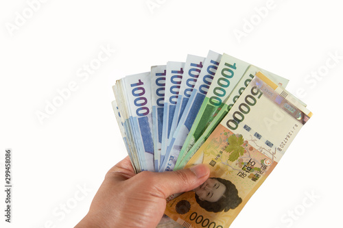 the money in a hand on white background for shopping.Shopping and Business concept