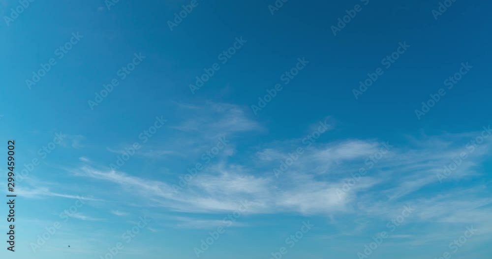 timelapse of Cirrus clouds on bright blue sky
