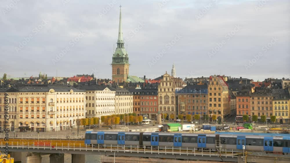 Stockholm Old Town city skyline. Train passing by in foreground. Stockholm Old Town city skyline. Train passing by in foreground.