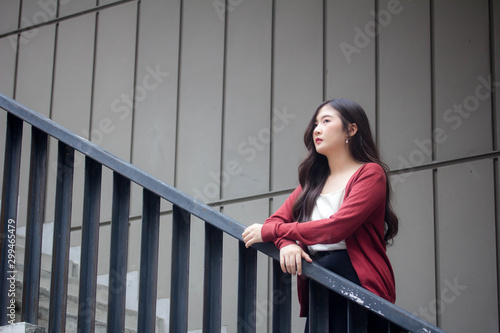 Portrait of thai adult working women white shirt relax and smile photo