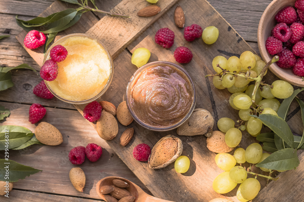 Almond Butter and Marzipan butter on a Wooden natural Table with Raw nuts