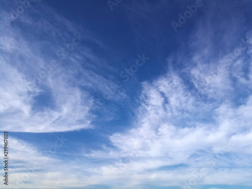 Bright blue sky with cirrus clouds in the winter morning