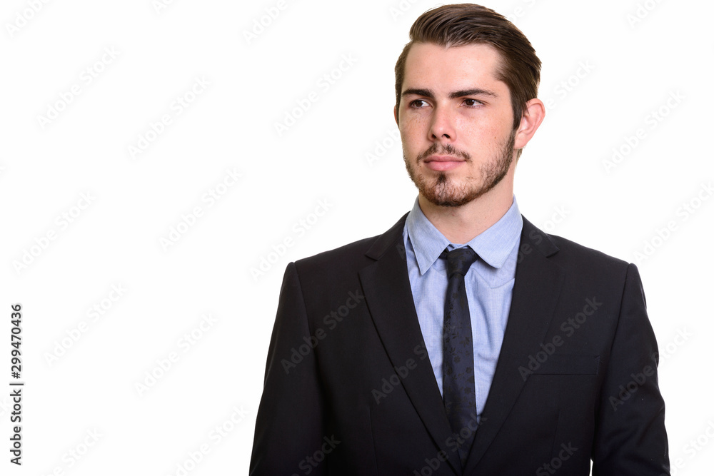 Portrait of young handsome bearded businessman in suit Portrait of young handsome bearded businessman in suit