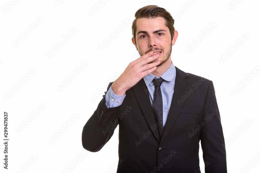 Portrait of young handsome bearded businessman in suit Portrait of young handsome bearded businessman in suit