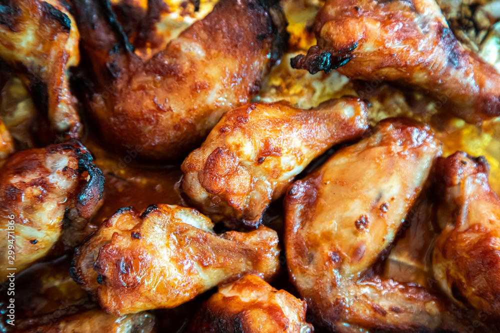 Close up image Grilled chicken wings and legs on  table, Top view.