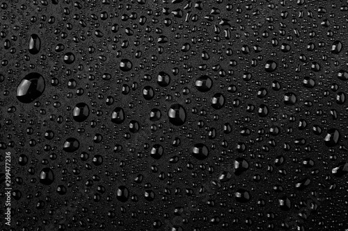Water droplets on black background