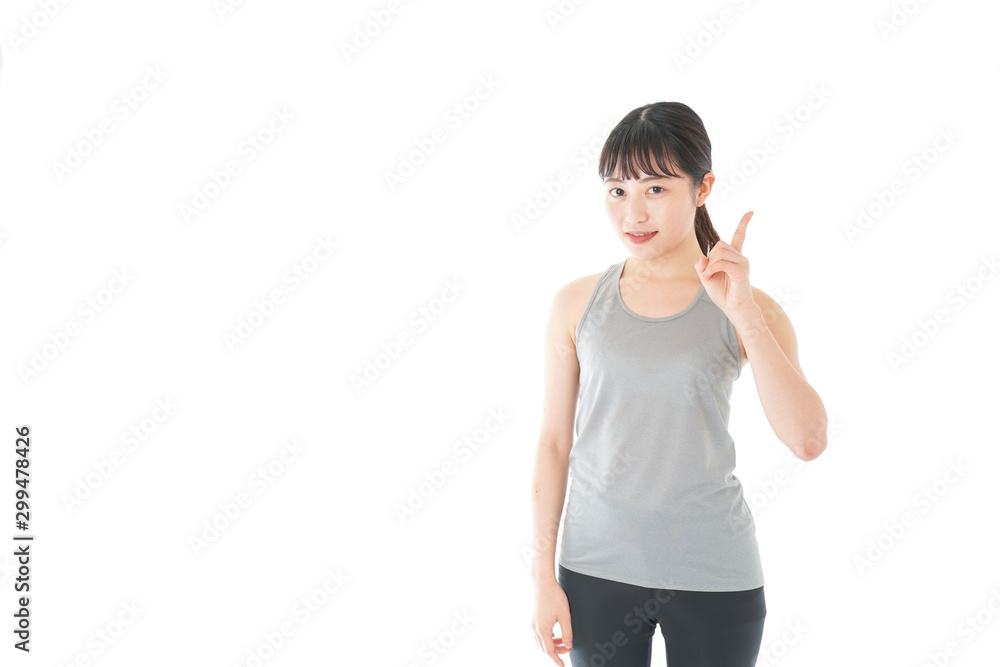 アドバイスをするスポーツウェアを着た若い女性