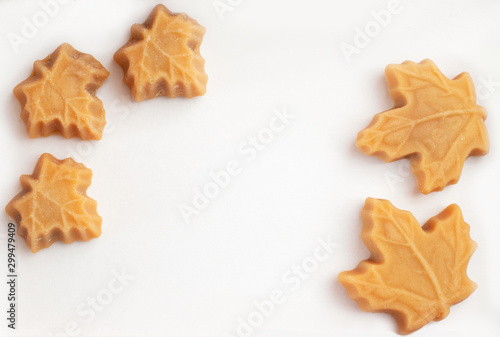 Maple syrup sweets on a white background