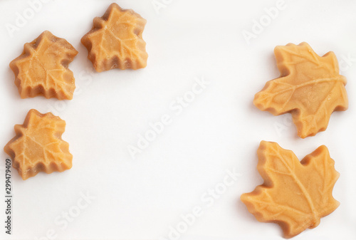 Maple syrup sweets on a white background