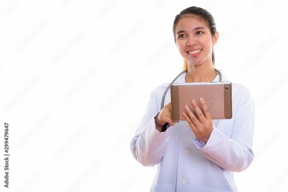 Portrait of young Asian woman doctor using digital tablet Portrait of young Asian woman doctor using digital tablet
