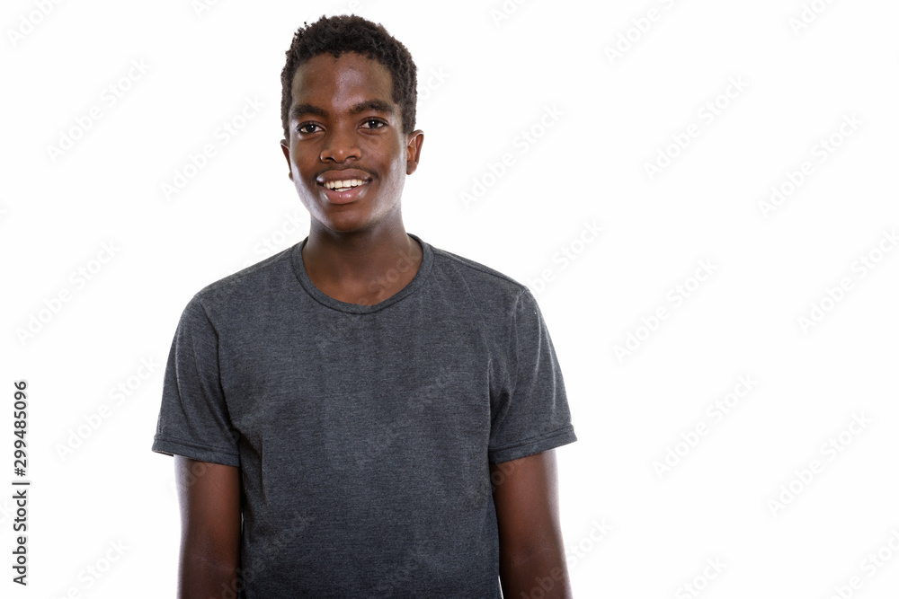 Obraz premium Studio shot of young African teenage boy with Afro hair