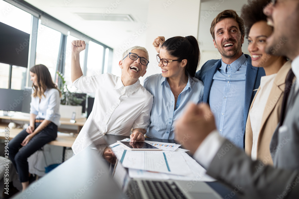 Group of successful business people at work in office Group of successful business people at work in office