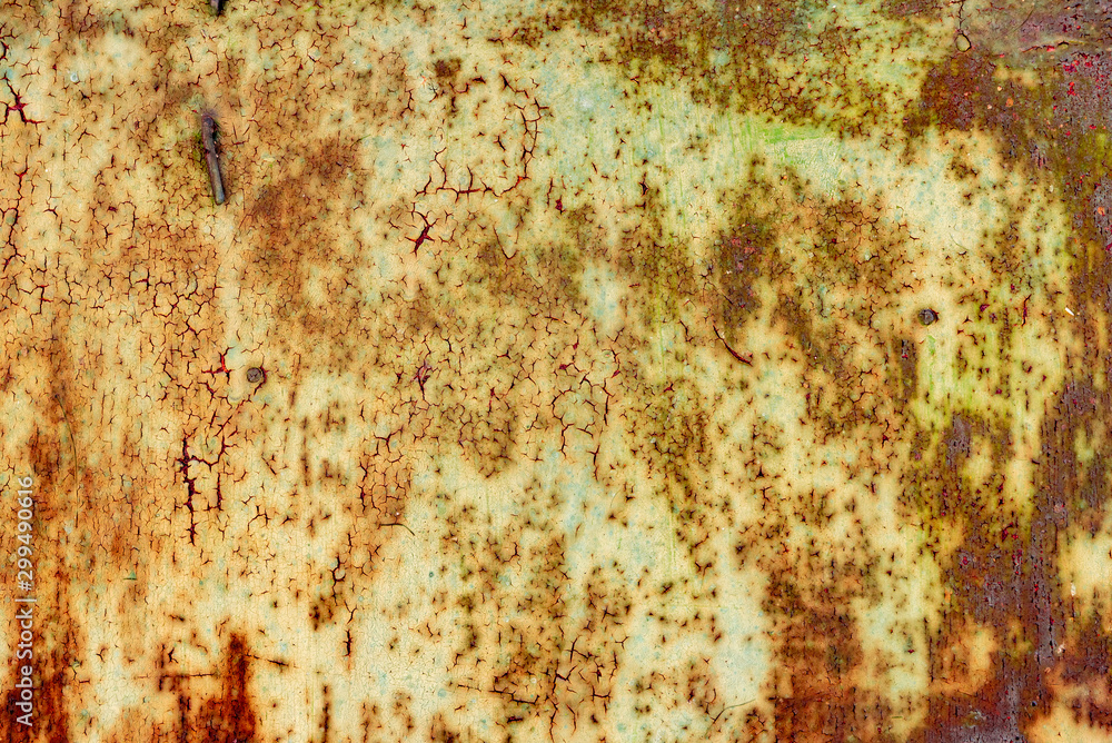 Metal texture with scratches and cracks which can be used as a background Metal texture with scratches and cracks which can be used as a background