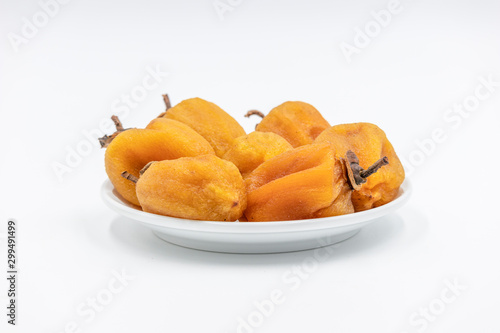 Dry hoshigaki persimmon on white